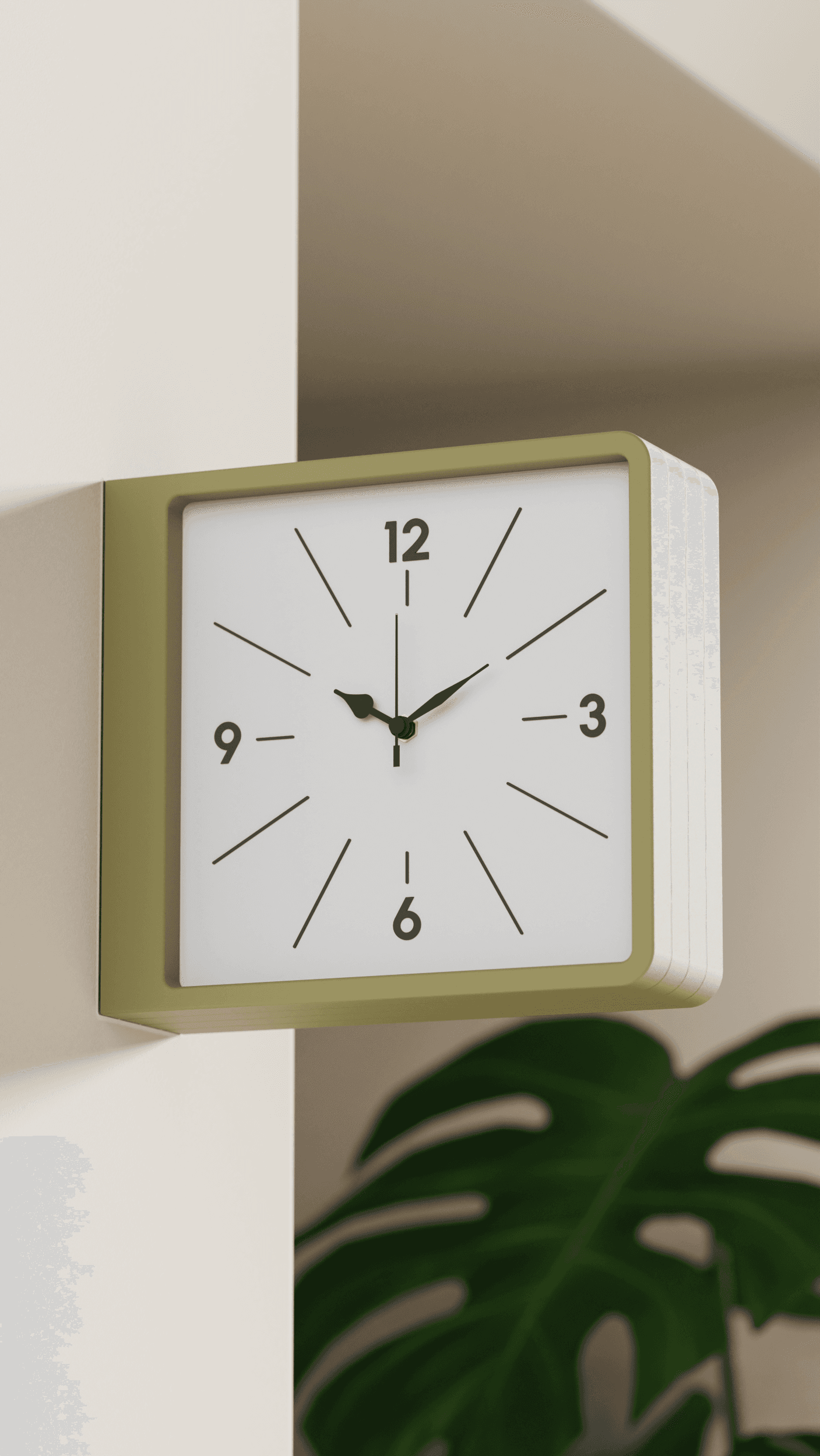 MASU square wall clock in olive green, mounted on a wall